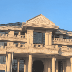 河北黄金麻别墅外墙干挂石材效果示例