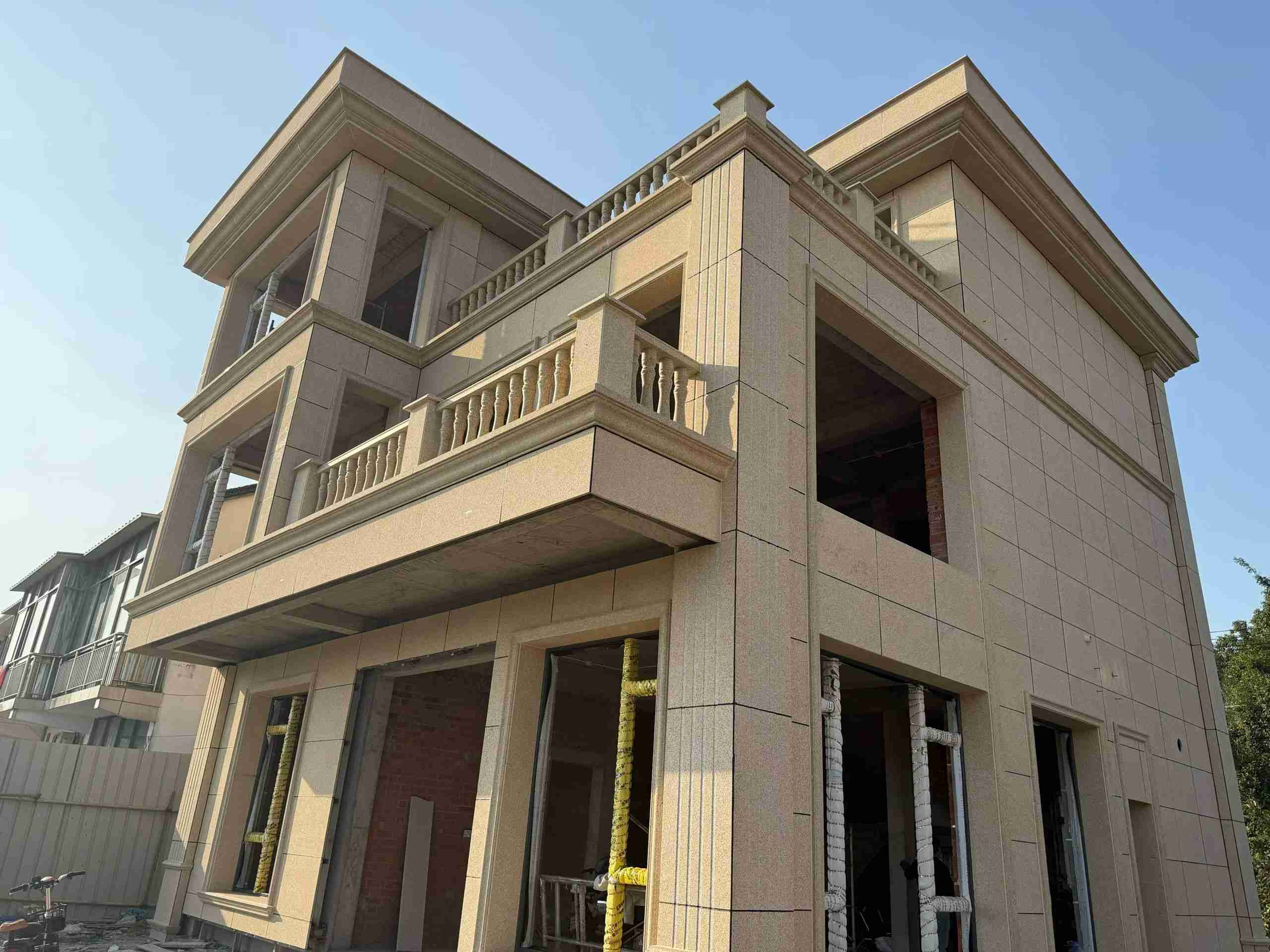 河北 黄金麻花岗岩石材荔枝面外墙干挂效果展示